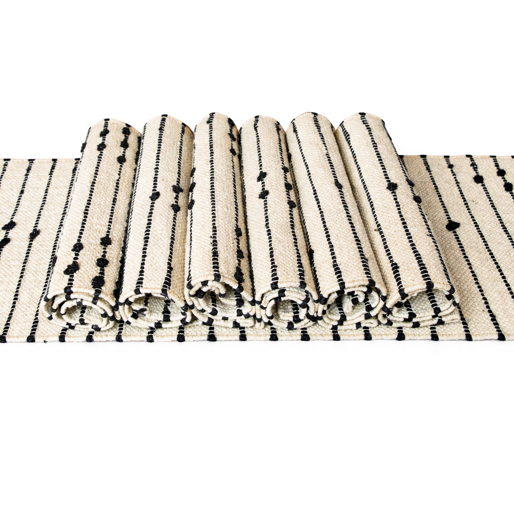 Striped fabric with black and beige pattern on a white background