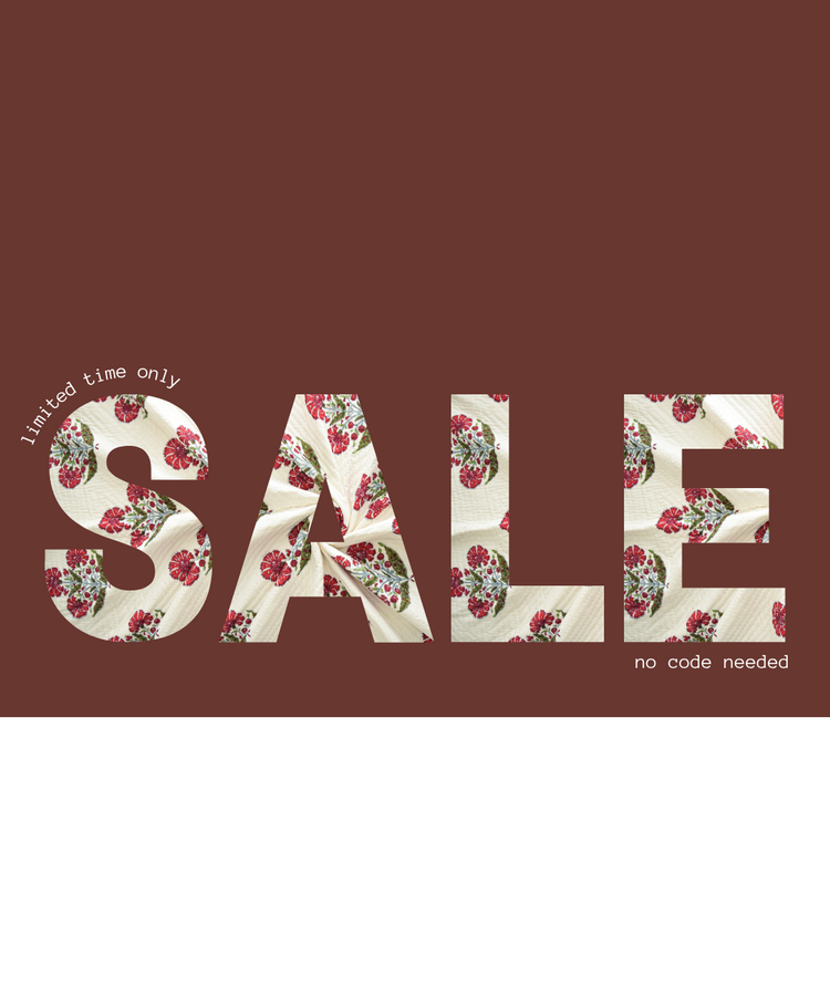 Floral-patterned 'SALE' text on a brown background