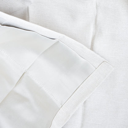 Close-up of white fabric with a textured pattern