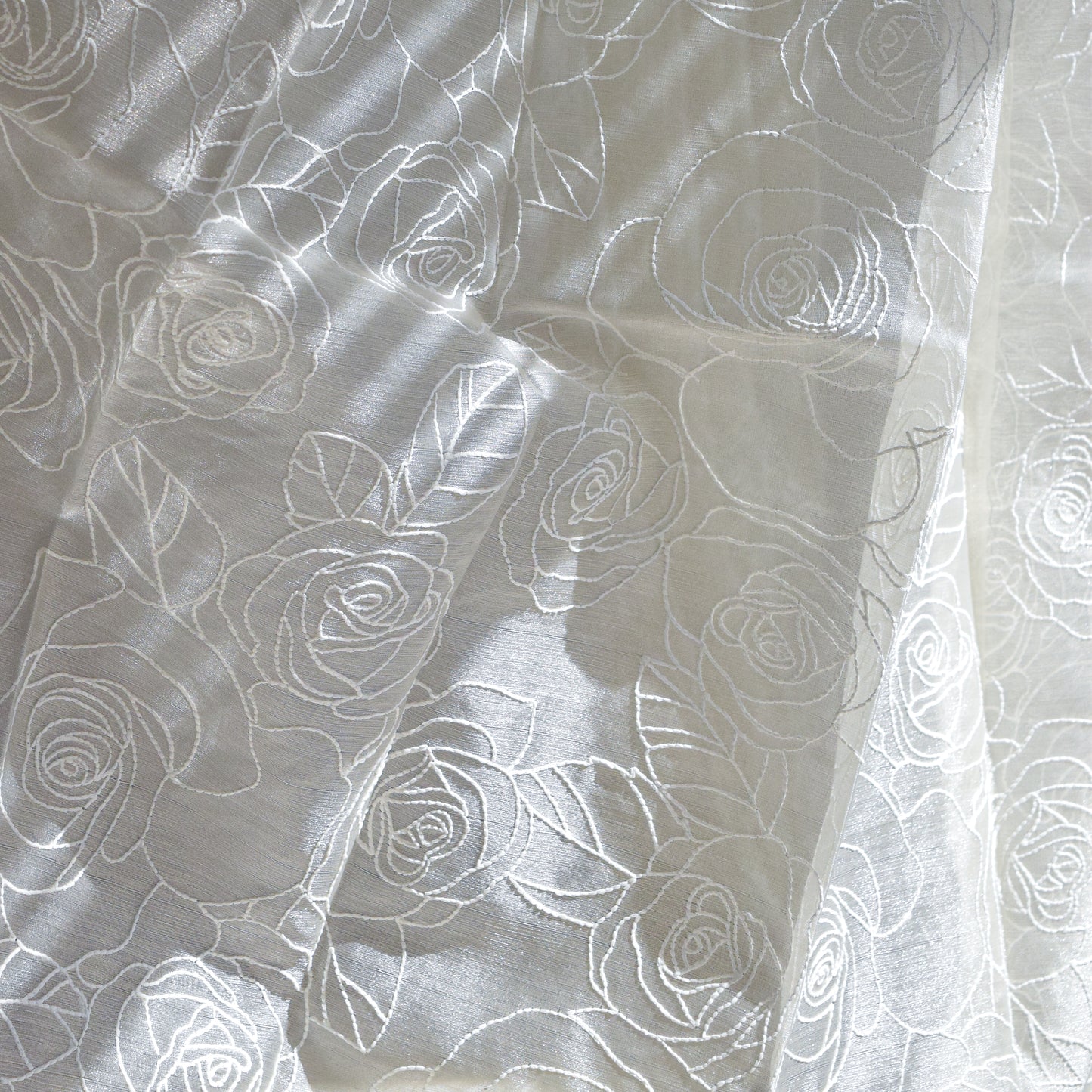 White fabric with rose pattern