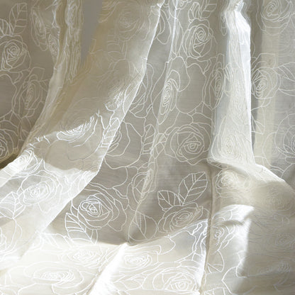 White curtain fabric with subtle rose pattern