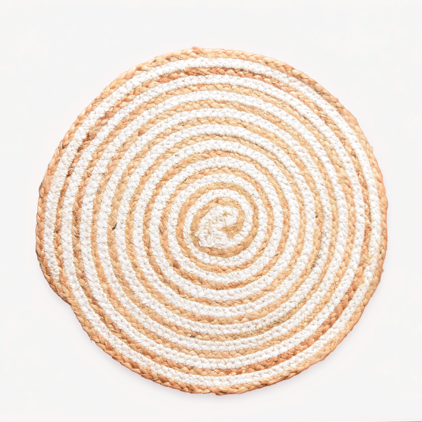 Round woven mat with concentric circles of beige and white on a light gray background