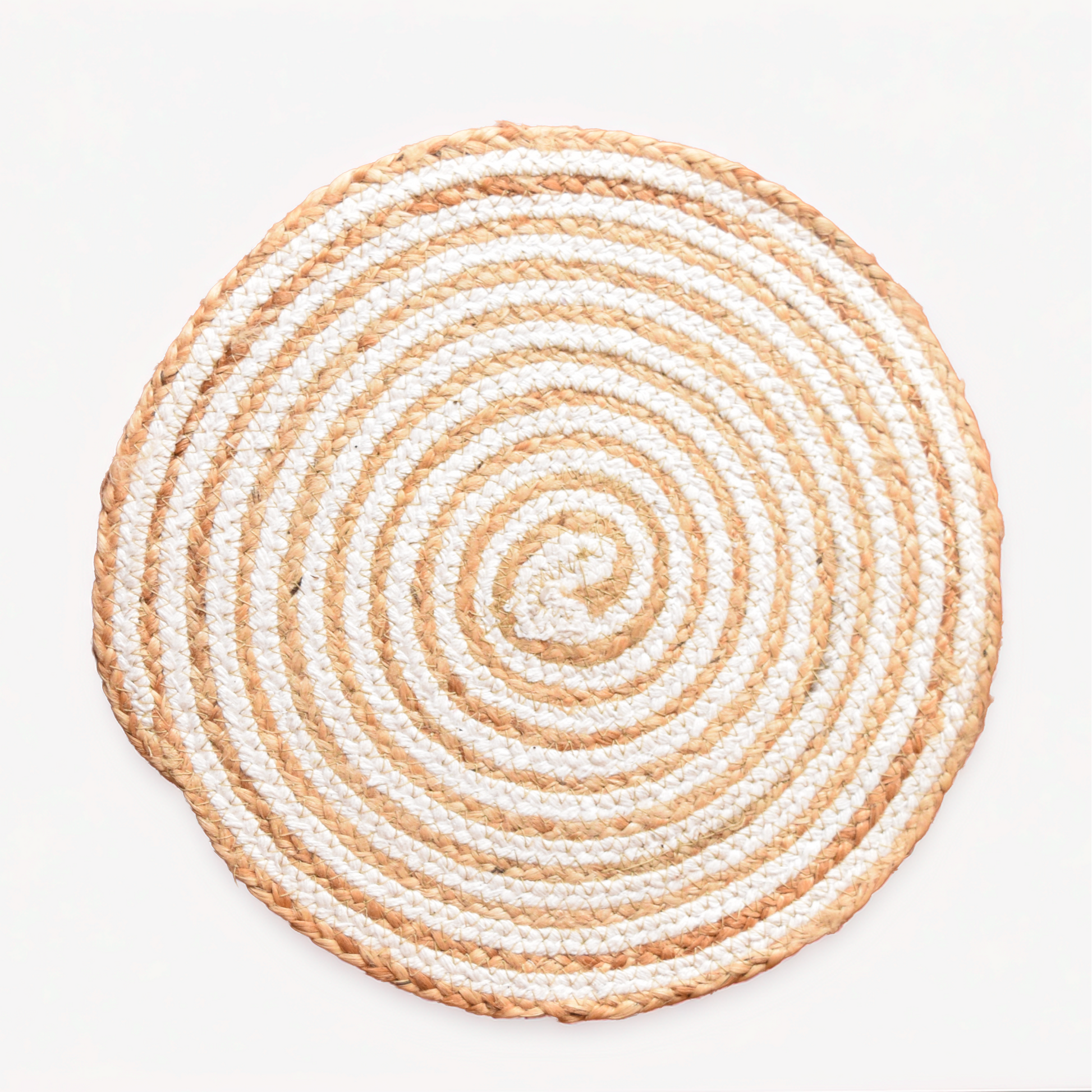 Round woven mat with concentric circles of beige and white on a light gray background