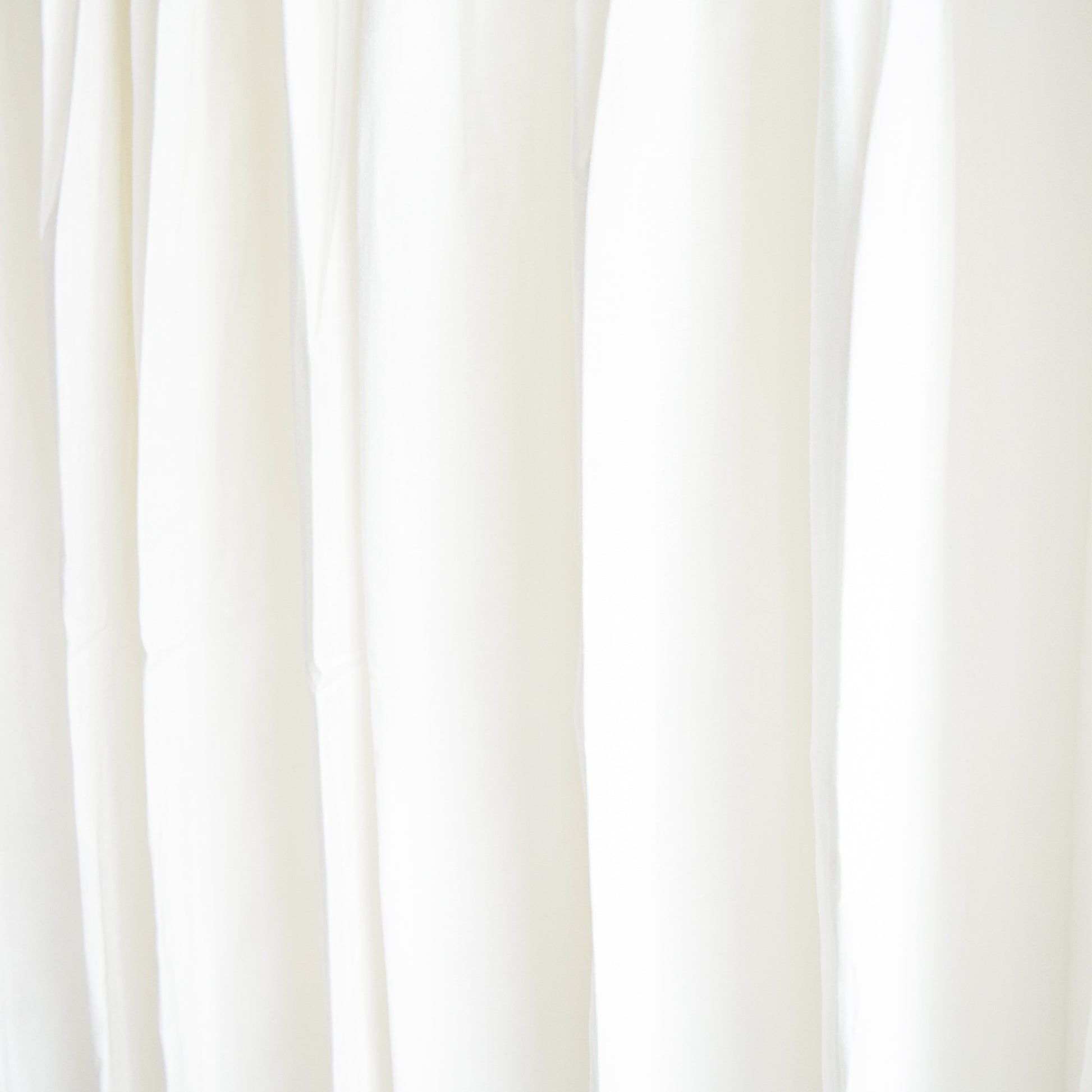 Close-up of white curtains with a soft focus