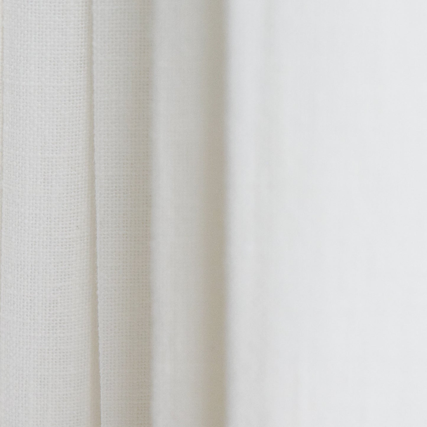 Close-up of white fabric with subtle texture